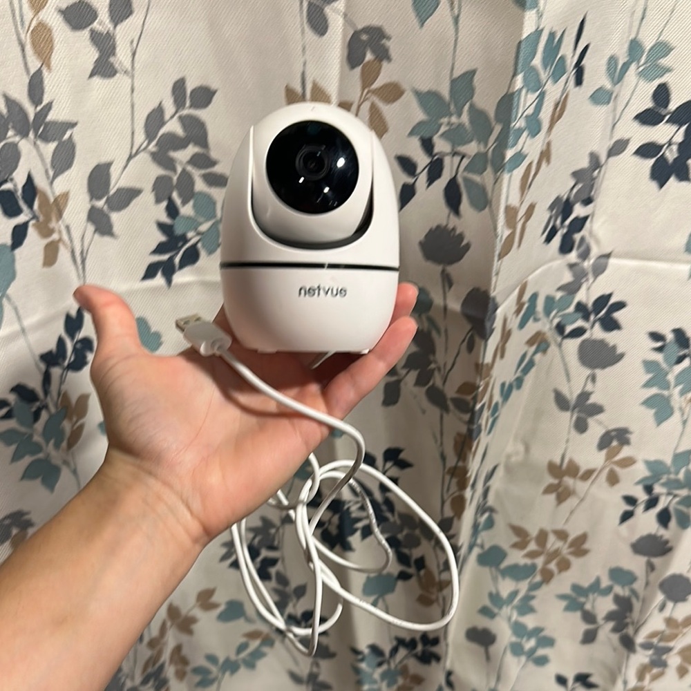 White Netvue Security Camera